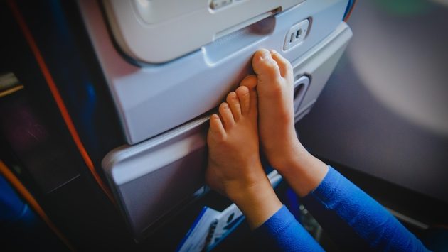 Bare feet on an airplane Bare feet on an airplane