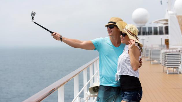Couple taking a selfie on a cruise ship