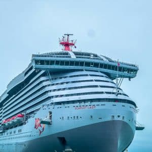 a large cruise ship docked in the water