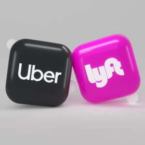 Uber and Lyft app icons side by side — rideshare pricing comparison