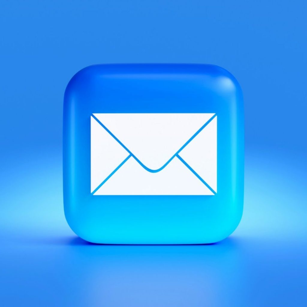 a blue button with a white envelope on it